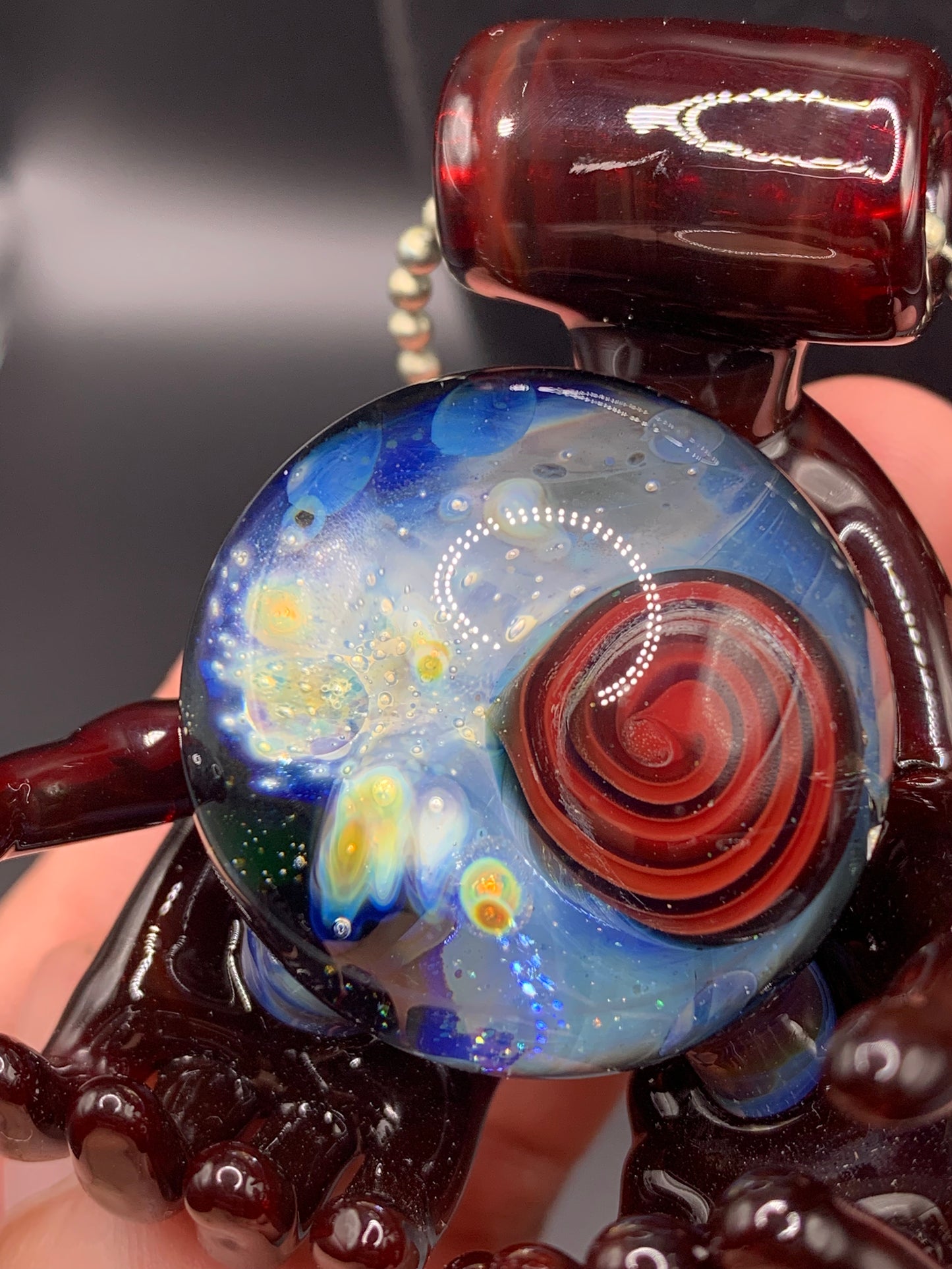 GreymarketGlass - Lil Gremlins Glass Shack Collaboration UV Space in hands pendant